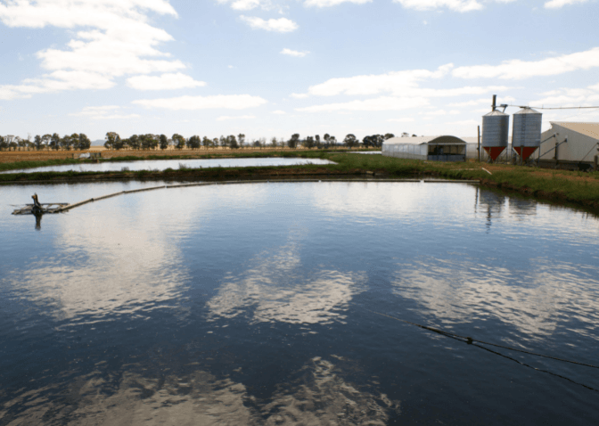 silo's next to a damn of water